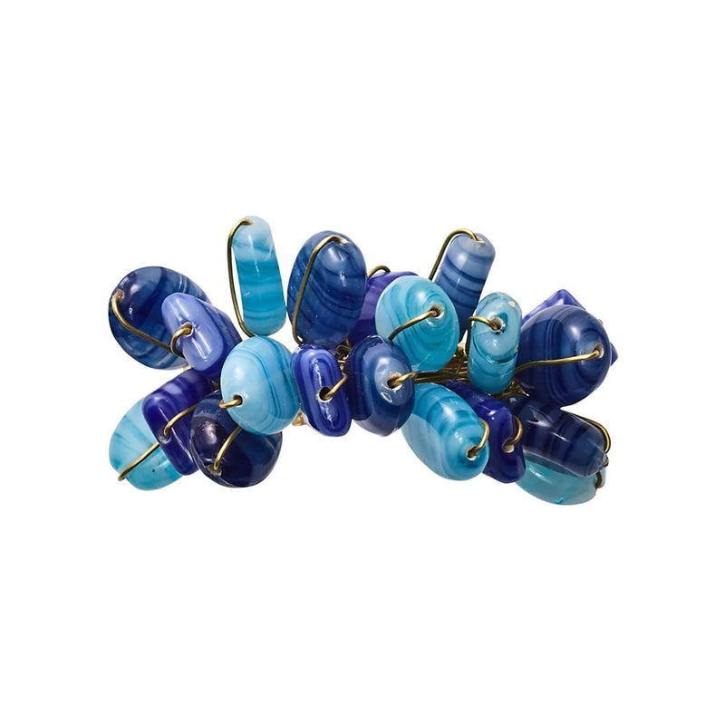 Top view of Poppy Napkin Ring set showcasing striated blue beads and intricate beadwork