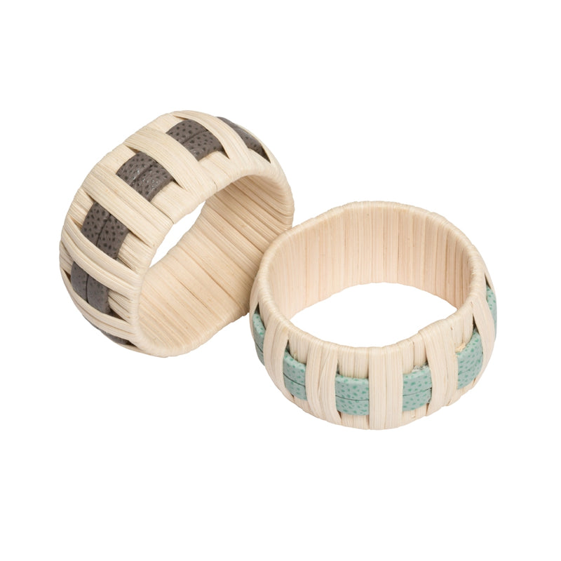 Two Anglet Napkin Rings in rattan with calfskin leather in Smoke G24 and Mint G46