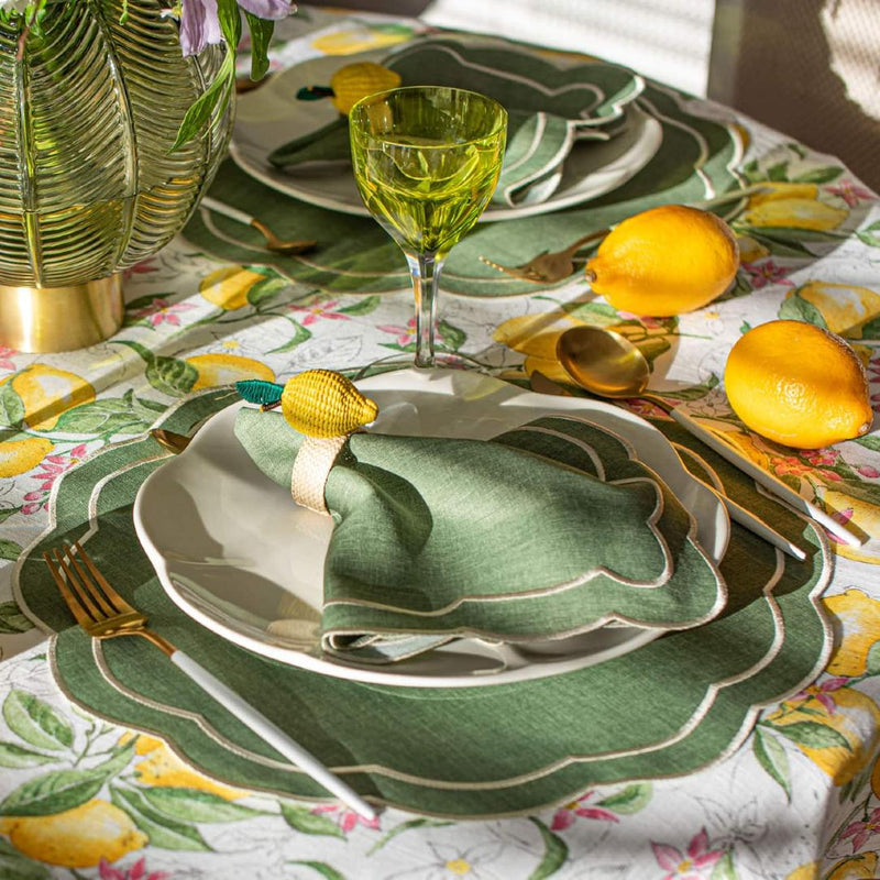Side view of table setup with Lemon Rings napkin rings by Roseberry Home in a palette of green, beige, and yellow
