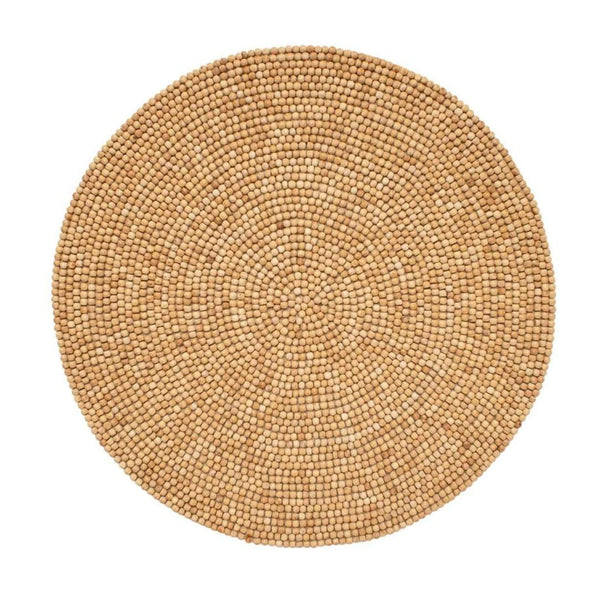 Natural wood bead round placemat by Kim Seybert.