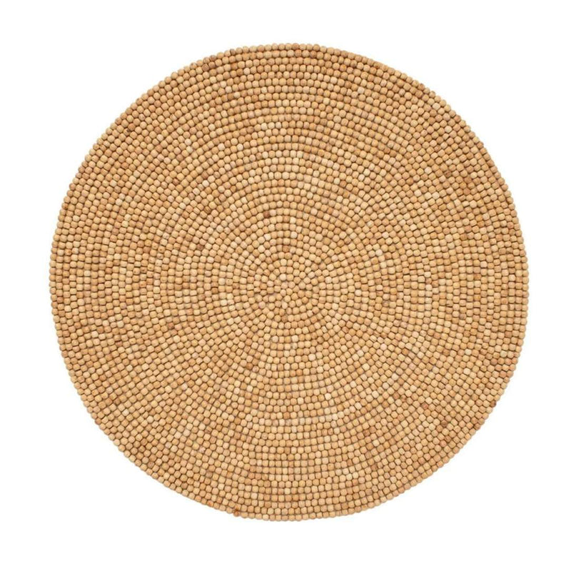 Natural wood bead round placemat by Kim Seybert.