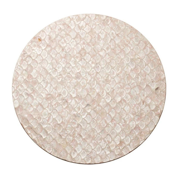 Blush pink Capiz shell placemat with scalloped edges by Kim Seybert.