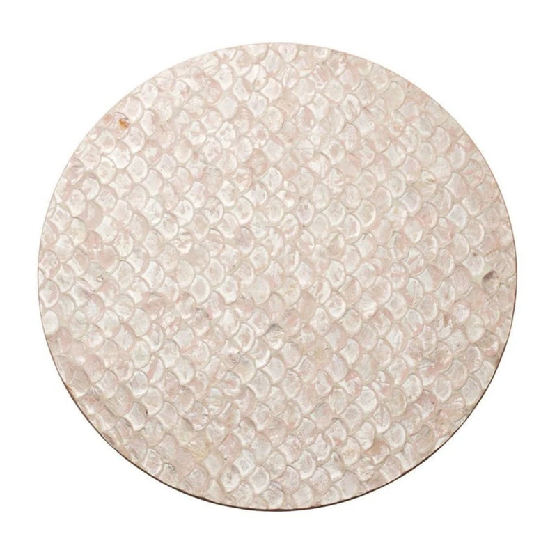 Blush pink Capiz shell placemat with scalloped edges by Kim Seybert.