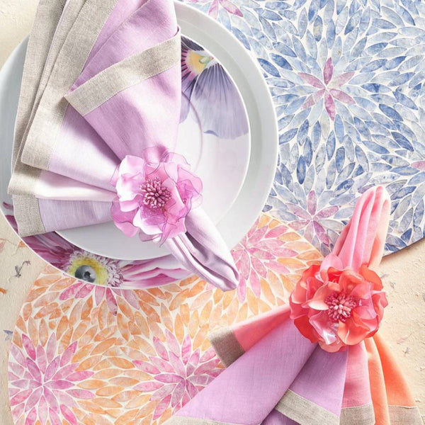 Pink and orange Capiz shell placemat in floral ombre design in two colour options.