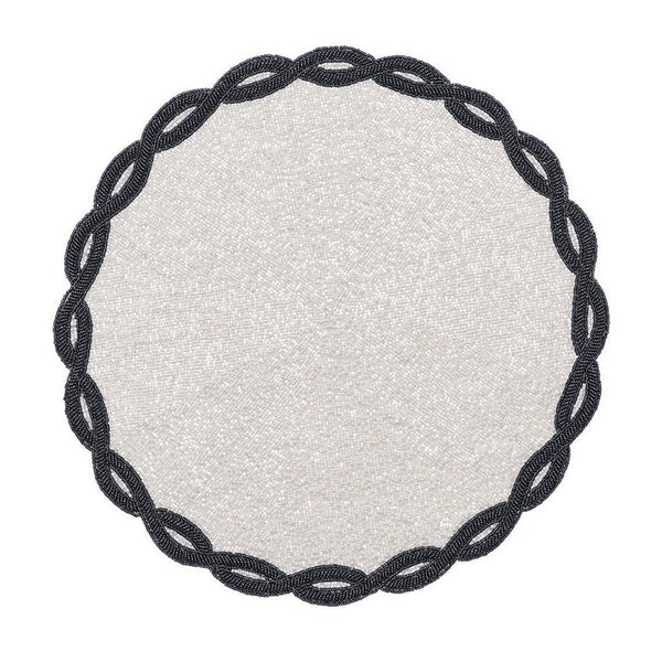 White and navy hand-beaded Infinity placemat with loop motif by Kim Seybert.