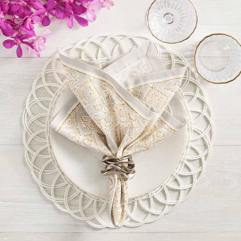 Luxury white faux rattan Alfresco placemat by Kim Seybert with elegant napkin.