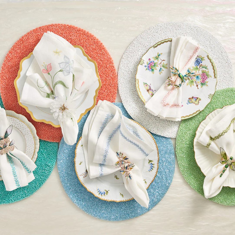 Green hand-beaded placemat with vermicelli pattern different styling options in various colours.