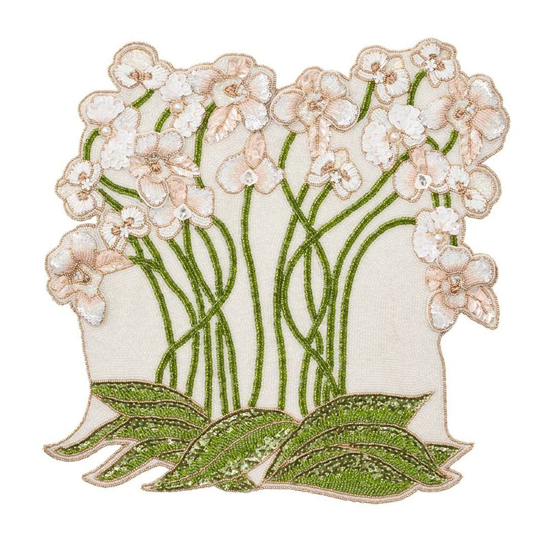 Kim Seybert Orchid placemat with multicolor gemstones and beads.