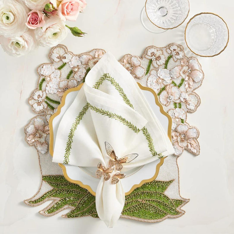 Luxury Orchid placemat in multi, styled with butterfly napkin ring.