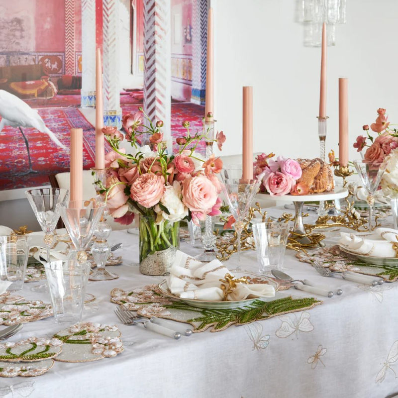 Luxury Orchid placemat in multi, styled on an pink floral tablescape.
