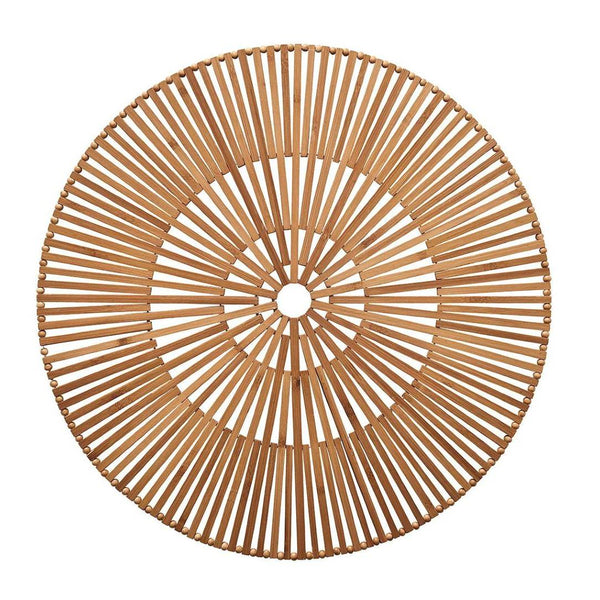 Brown Spoke bamboo placemat in hand-cut geometric design.