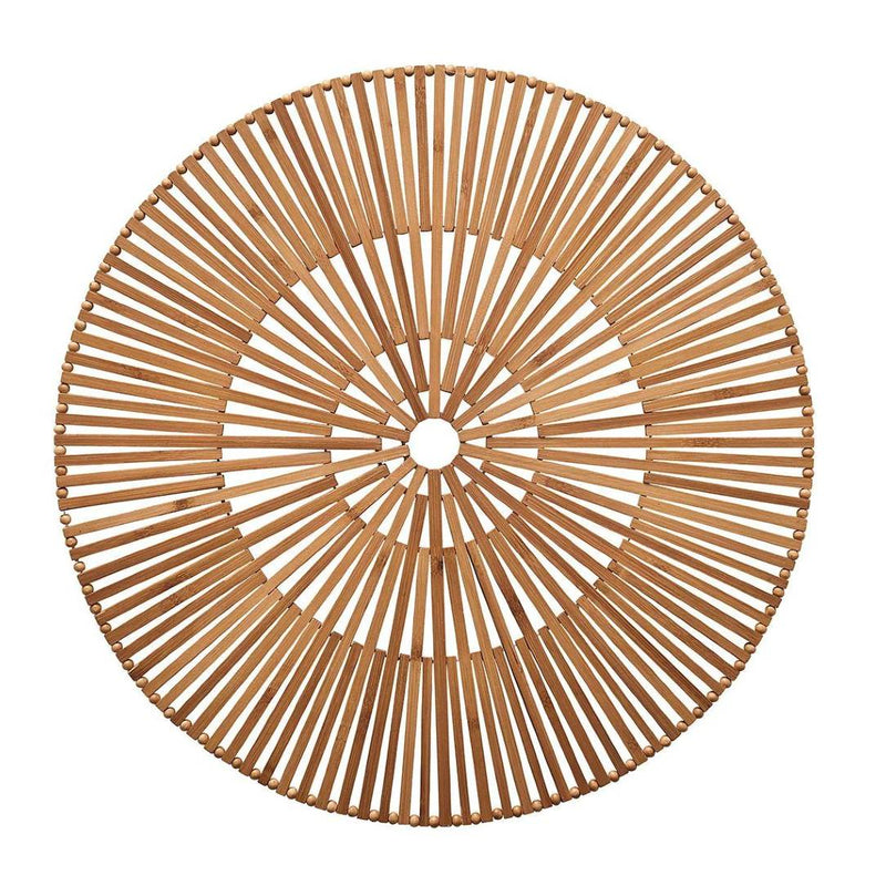 Brown Spoke bamboo placemat in hand-cut geometric design.