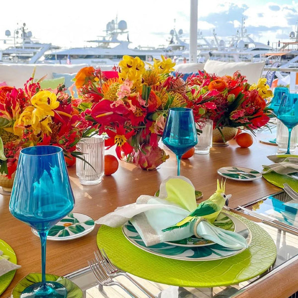 Citron green Croco placemat with embossed faux crocodile texture on yacht tablescape.
