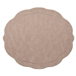 Kim Seybert taupe faux leather oval placemat with wavy edge.