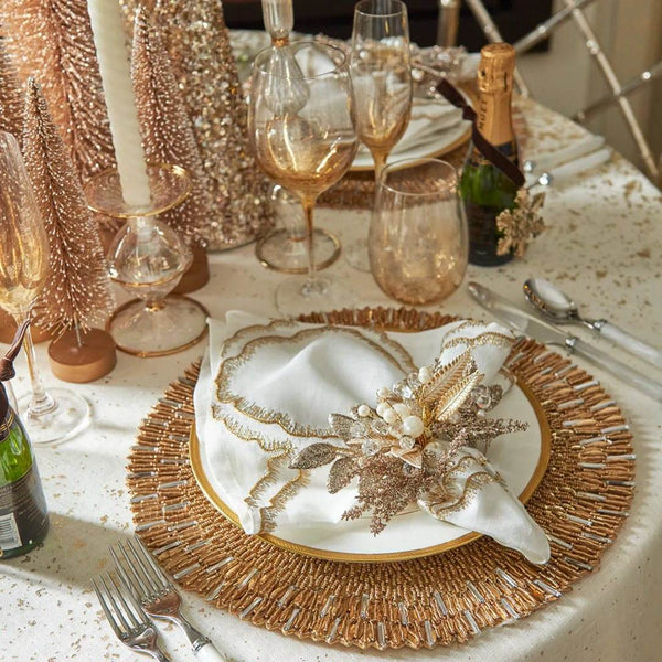 Kim Seybert Ray placemat in gold and crystal sequins on gold Christmas lux tablescape.