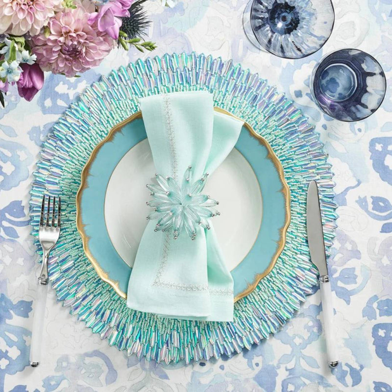 Periwinkle and seafoam beaded ombre placemat with radiant sequins with blue napkin ring.