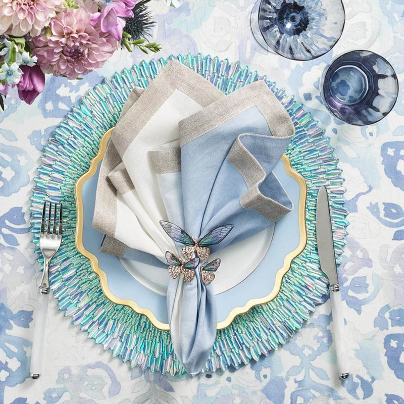 Periwinkle and seafoam beaded ombre placemat with radiant sequins with butterfly napkin ring.