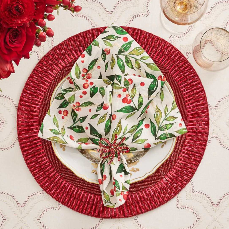 Red Palisade beaded placemat by Kim Seybert ith classic Christmas napkin.