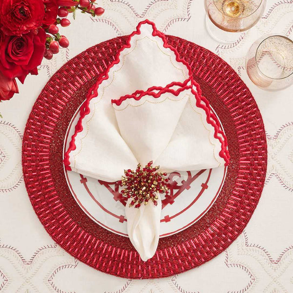 Red Palisade beaded placemat by Kim Seybert with red napkin ring.