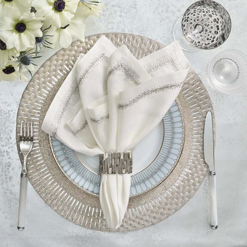 Palisade beaded placemat and crystal beaded border in silver by Kim Seybert styled with silver napkin ring.