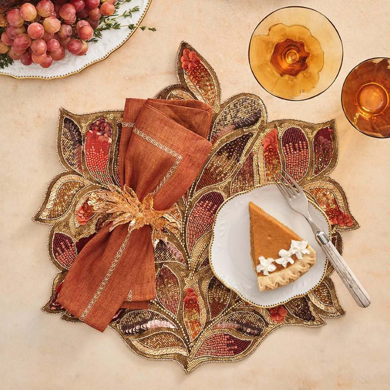 Maple Hues placemat with autumn leaves by Kim Seybert on autumnal luxury tablescape.