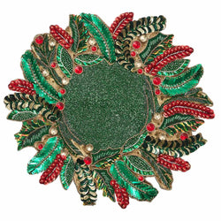Beaded Christmas placemats with holly in green, red, and gold by Kim Seybert.