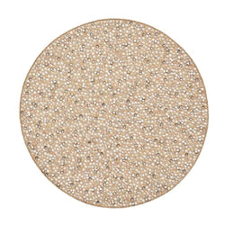 Hand-beaded champagne and crystal round placemat by Kim Seybert.