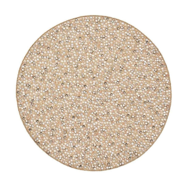 Hand-beaded champagne and crystal round placemat by Kim Seybert.
