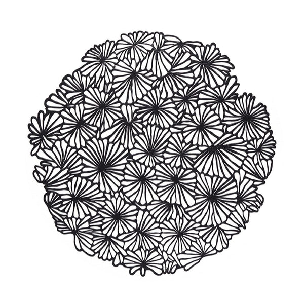 Chilewich round daisy placemat in black.