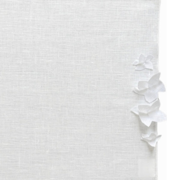 White rectangular linen placemat with 3D jasmine flowers close-up flower detail.