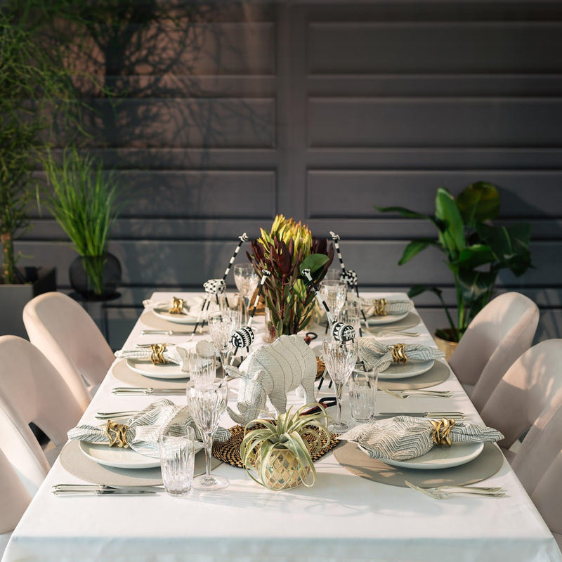 Grey faux shagreen placemat with textured finish by Kim Seybert luxury african table setting.