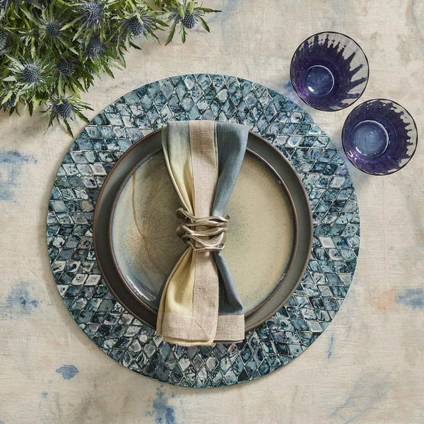 Bayou placemat with blue ink Capiz shells by Kim Seybert on modern tablescape.