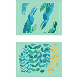 Reversible placemat with foliage motif and toucan design by Alto Duo.