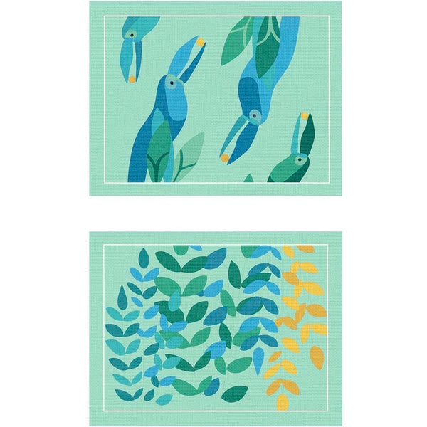 Reversible placemat with foliage motif and toucan design by Alto Duo.