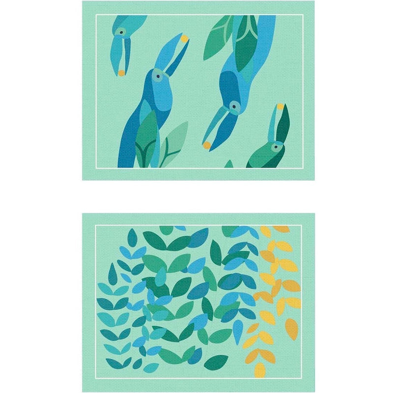 Reversible placemat with foliage motif and toucan design by Alto Duo.