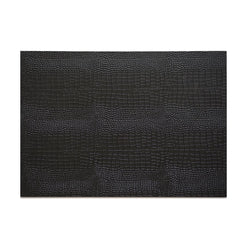 Black faux python placemat with detailed reptile scale pattern by Posh Trading Company.
