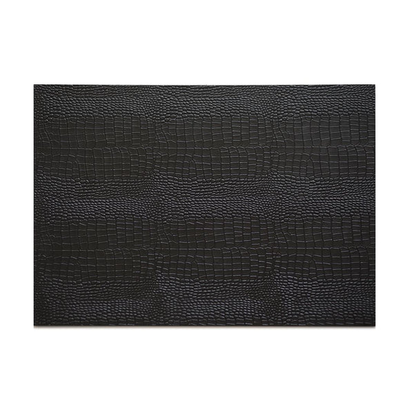 Black faux python placemat with detailed reptile scale pattern by Posh Trading Company.