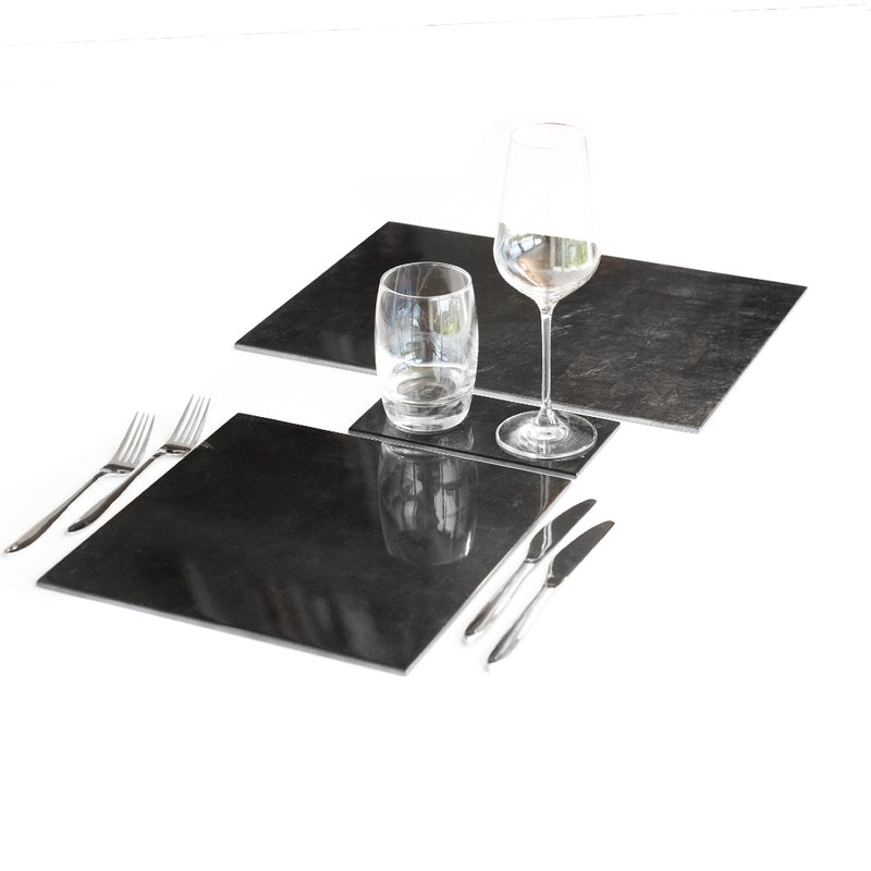 Stormy sky silver leaf placemat with polished lacquered finish with matching coasters.