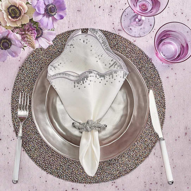 Glamorous silver table arrangement with Glam Knot napkin rings by Kim Seybert