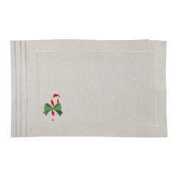 Beige cotton placemat with embroidered candy cane and gold border by Roseberry Home.