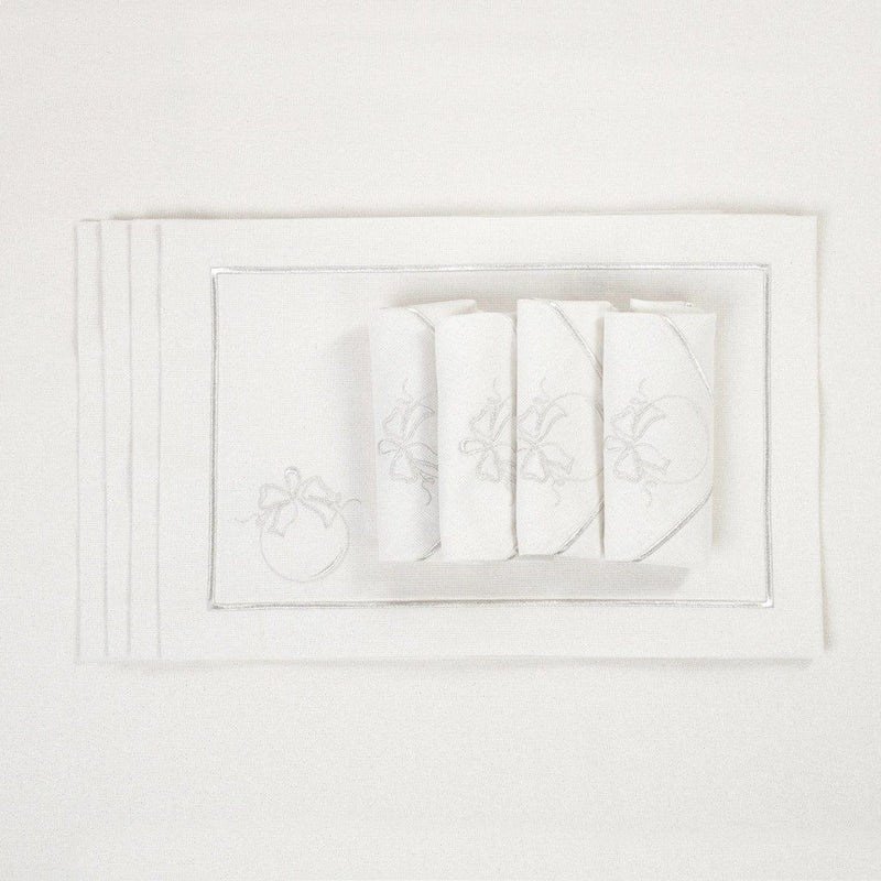 Silverline placemat with stitched border and bauble design with matching napkins.