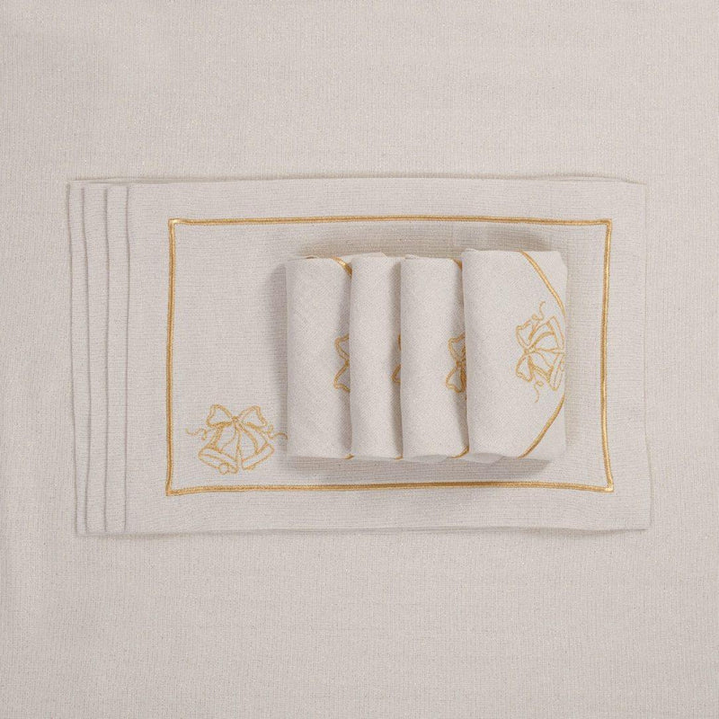 Embroidered Christmas bell detail on gold holiday placemat with matching napkins.
