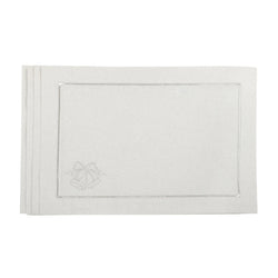 Silver placemat set with embroidered Christmas bells and border.
