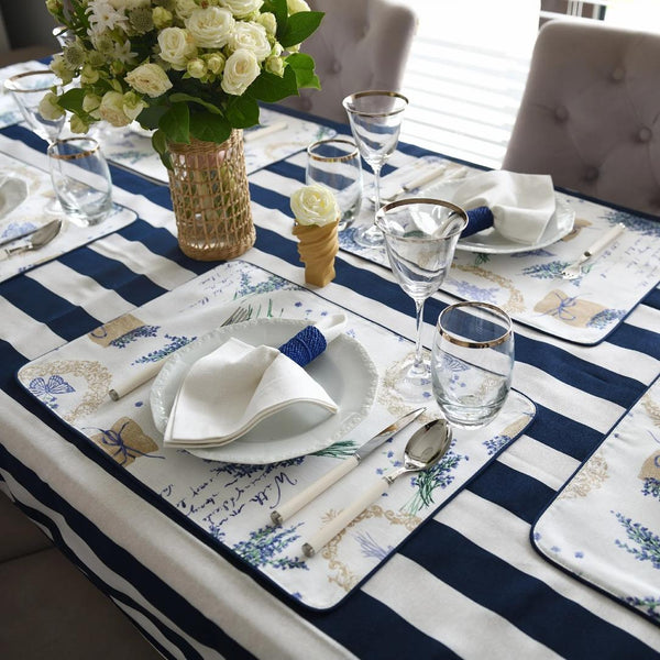 Reversible cotton placemat in lavender and white by Roseberry Home on french riviera tablescape.