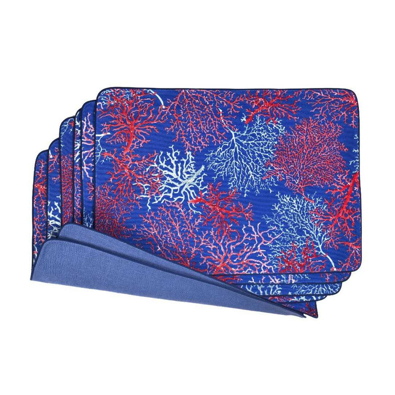Reversible cotton placemat with seaweed motif and royal blue reverse in set of six.