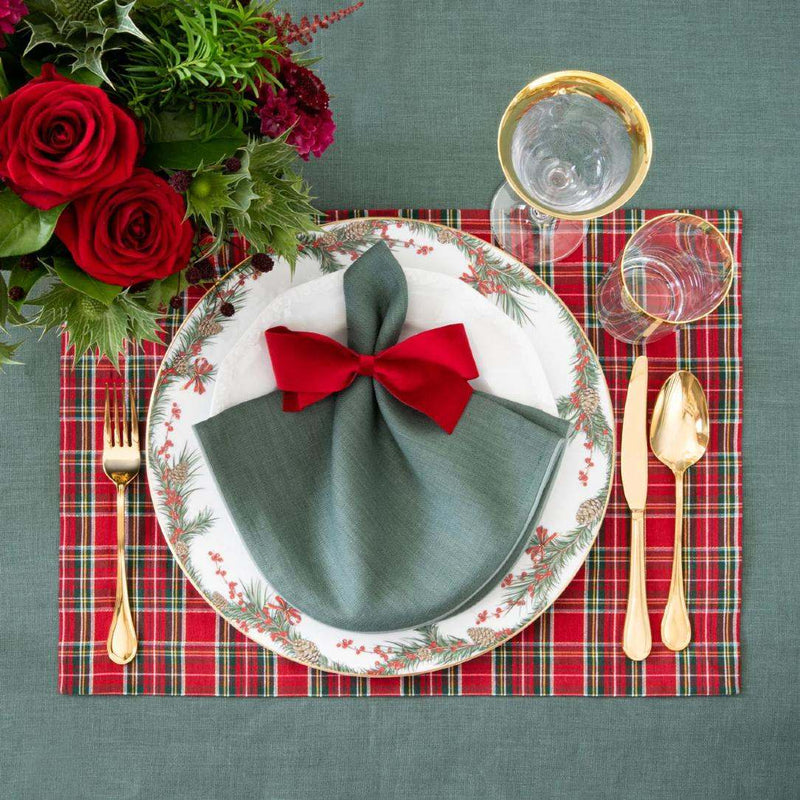 Red and green tartan placemat handmade from cotton fabric with red bow napkin ring.