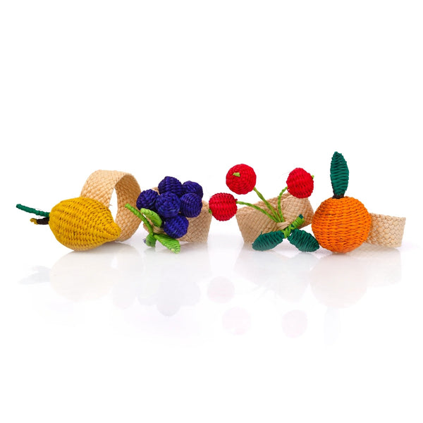 Set of 4 Rainbow Fruits napkin rings by Roseberry Home on white background, featuring lemon, orange, cherry, and grape designs