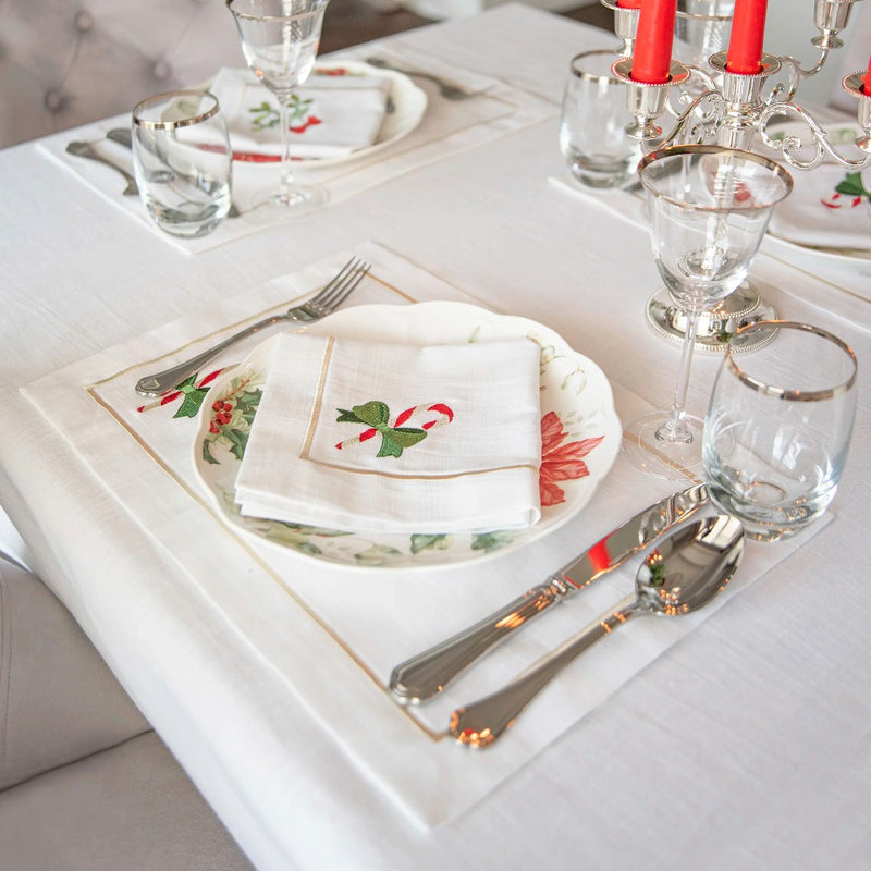 Roseberry Home Candy Cane napkin with elegant design folded on plate on Christmas table.