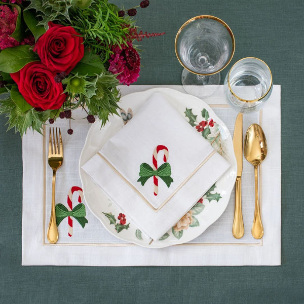 Roseberry Home Candy Cane napkin with elegant design folded on plate.

