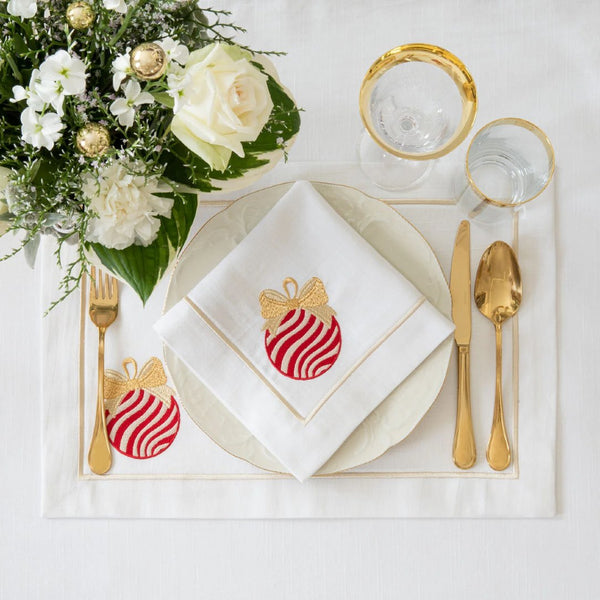 Roseberry Home Bauble napkins with  folded on plate.